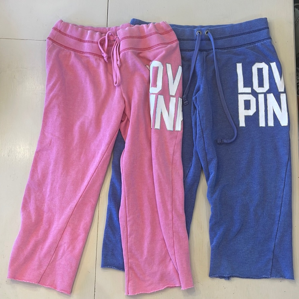 Two thigh high Pink sweatpants.